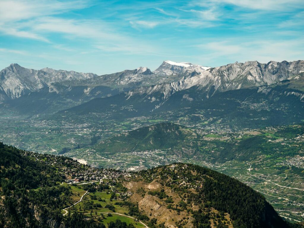 Explore a panoramic view of Anniviers' stunning mountain landscape in Wallis, Switzerland.