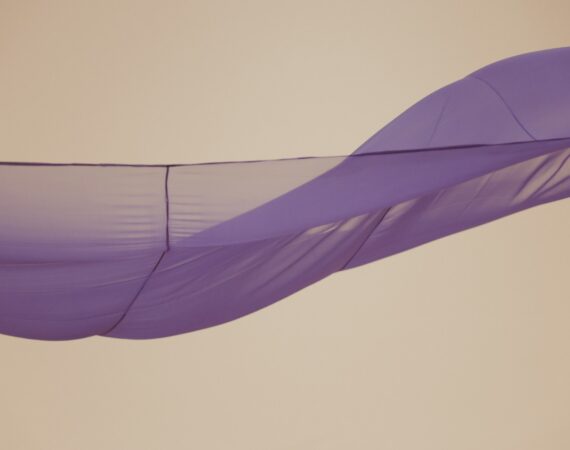 a blue tent with a line of lines on the top